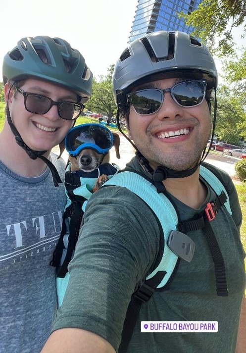 Photo of Miguel Astello and his boyfriend in the park