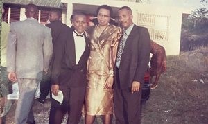 Turner with his parents in Jamaica