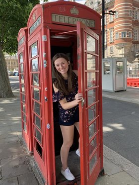 Hetki takes a picture from a telephone booth in London