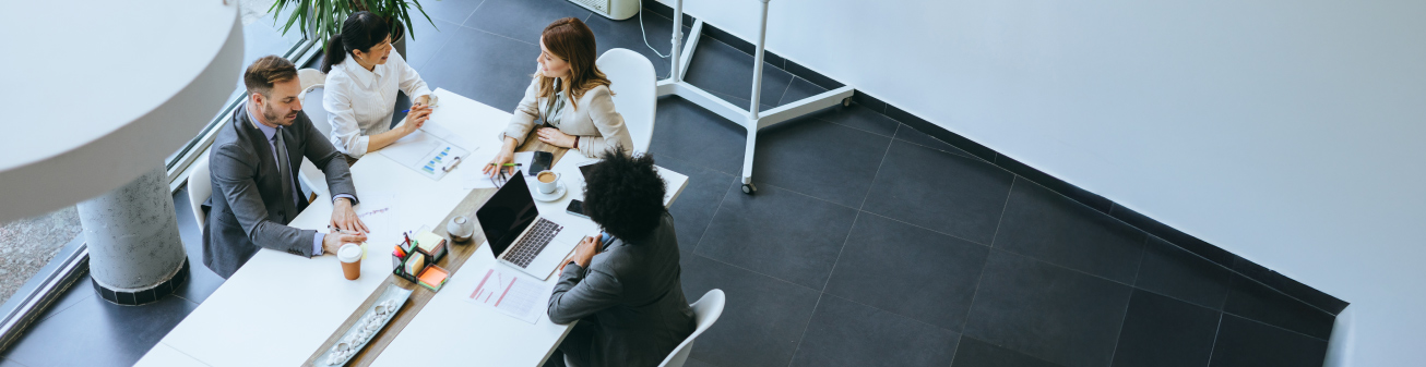 Employees in a meeting.