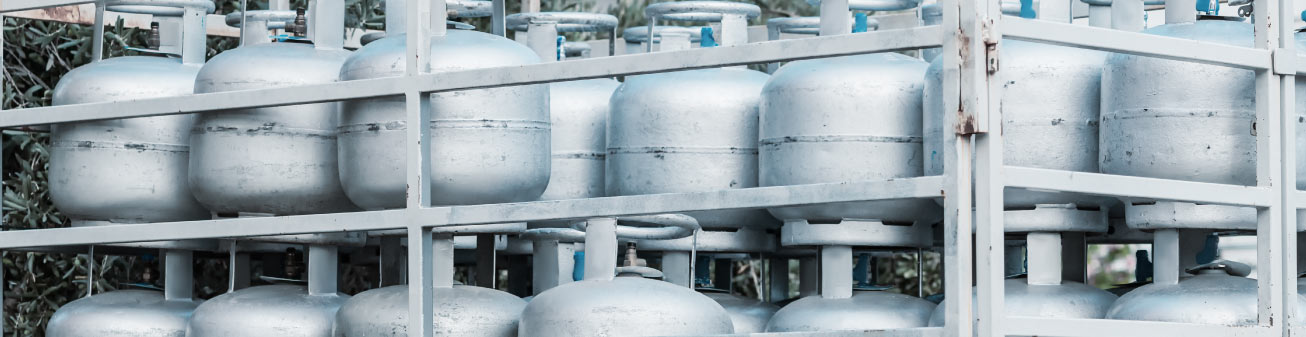 White barrels in a line.