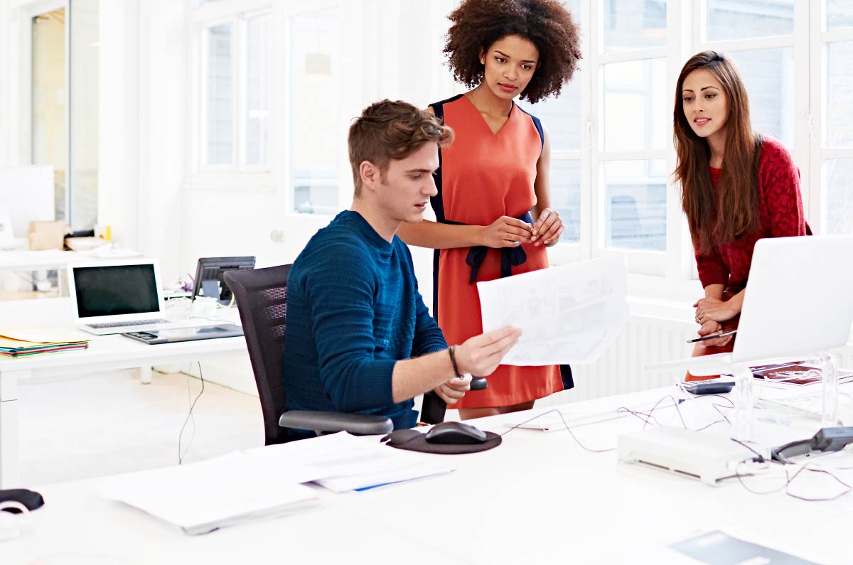 BDO employees reviewing paperwork