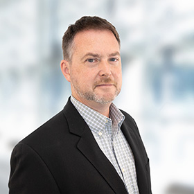 Professional Headshot of Dustin Stamper