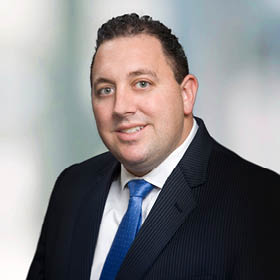Professional Headshot of Ryan Whitman