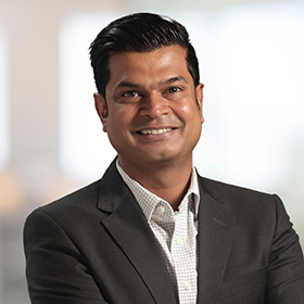 Professional headshot of Ajay Verma