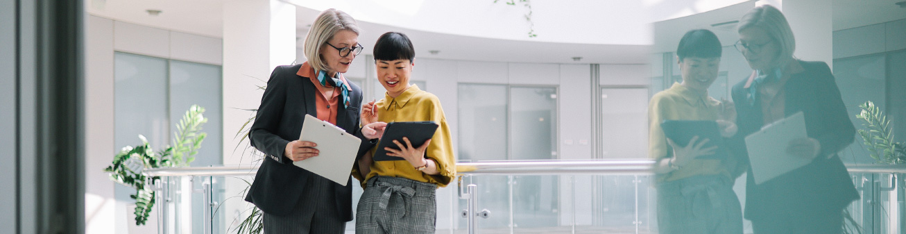 BDO Employees looking at mobile devices