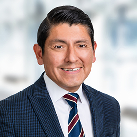 Professional headshot of Javier Alvarez