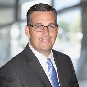 Professional Headshot of Douglas Gustin