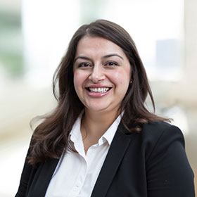 Professional headshot of Andreea Merewitz