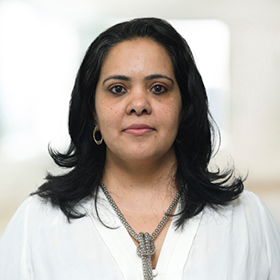 Professional headshot of Anuricha Chander