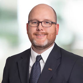 Professional Headshot of Sean Purple