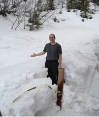 A picture of David shoveling snow in Alaska