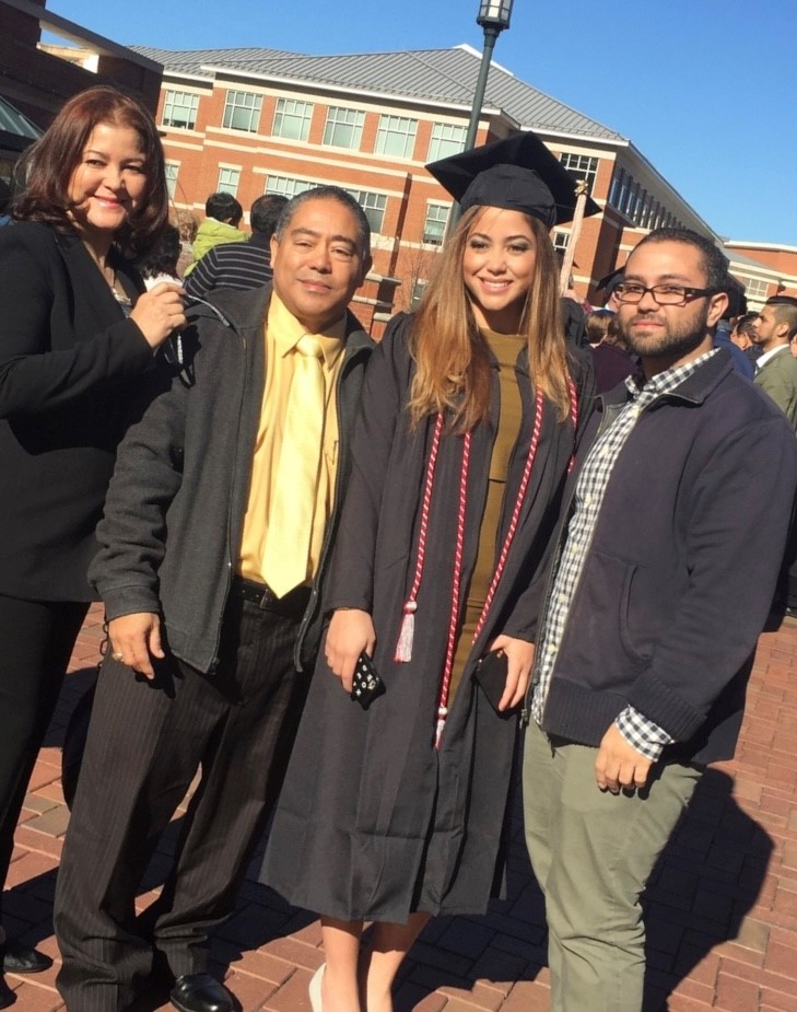 Picture of Genesis with her family at her graduation from the University of North Carolina